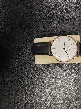Daniel Wellington White Dial Watch with Black Leather Strap and Rose Gold Case